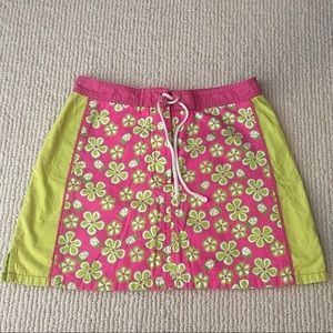 Lilly Pulitzer girls short skirt. Pink/lime green floral print. Size 8.